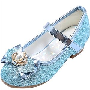 Light blue, glitter girl’s shoes with bow and crown accent.
